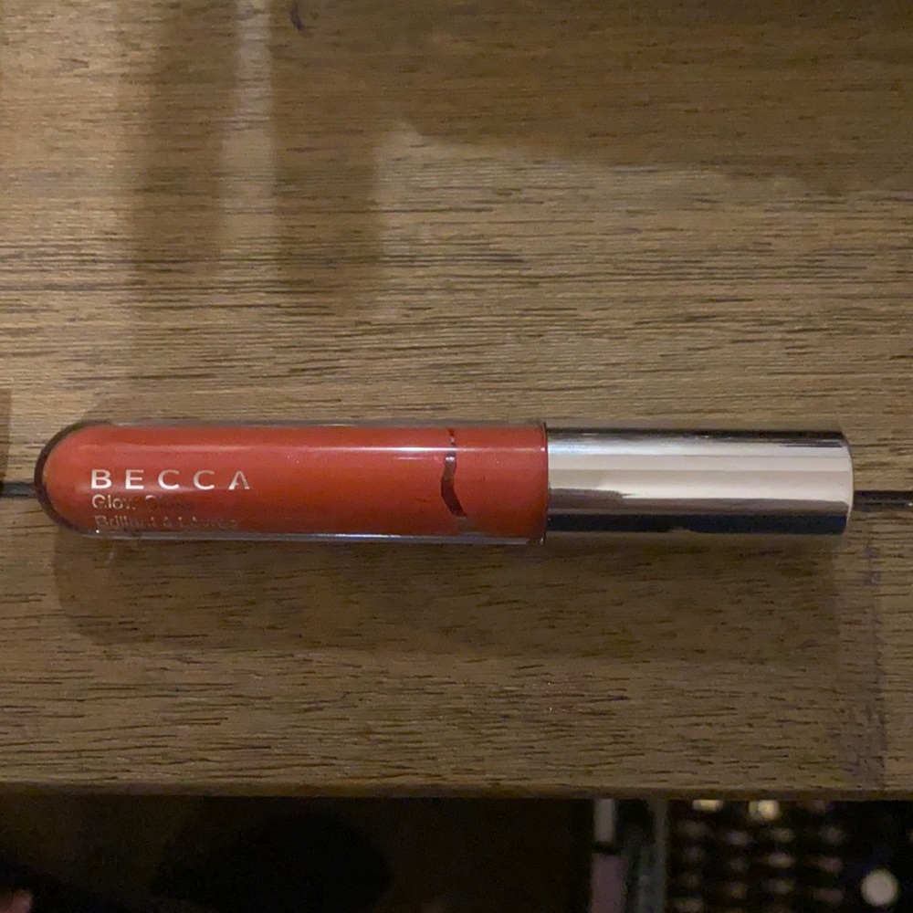 Brand new never used tiger lily Becca lipgloss